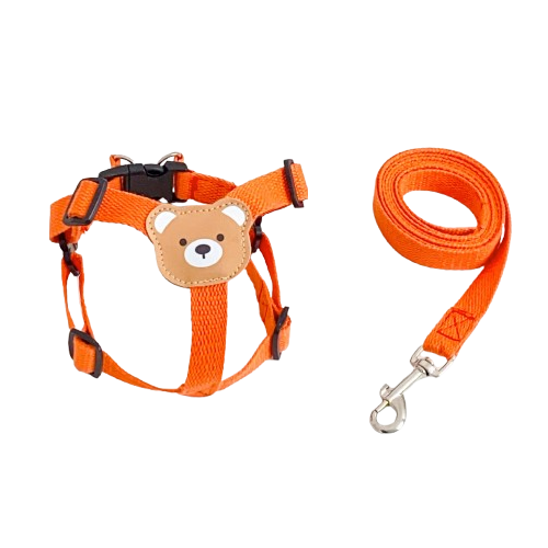 Harnais pour chiens fin orange avec nounours sur le dos. Vendu avec sa Laisse assortie. Confortable, convient aux petits chiens, chihuahuas, ou aux chats. Vendu dans la boutique « Mon Petit Chihuahua »