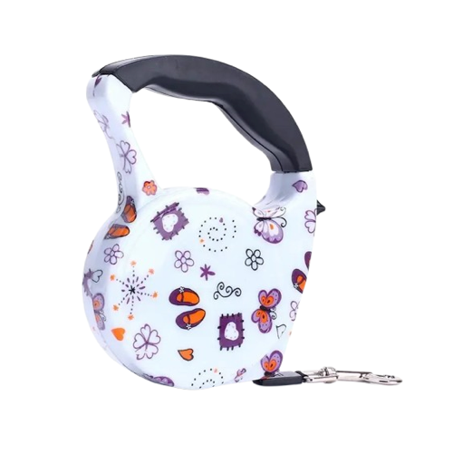 Laisse rétractable blanche avec motifs violets pour chiens. Pratique, convient aux petits chiens, chihuahuas, ou aux chats. Vendu dans la boutique « Mon Petit Chihuahua »