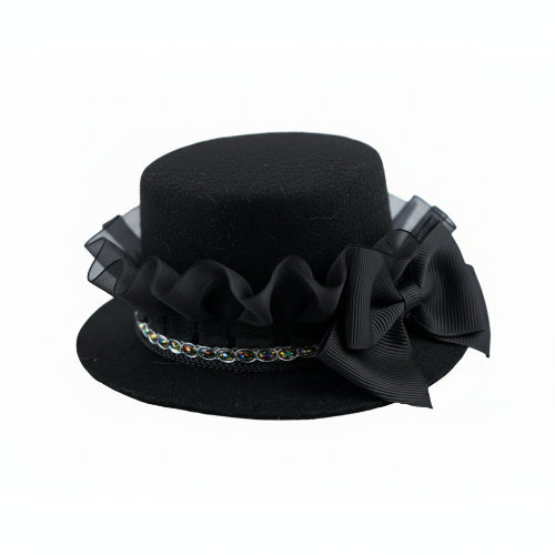Chapeau haut de forme noir avec un noeud noir pour petit chien, accessoire élégant et amusant vendu sur la boutique Mon Petit Chihuahua. Convient aussi aux chats.