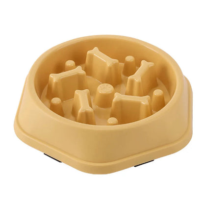 Gamelle anti gloutons avec des os en décoration. Matière plastique résistante de couleur jaune. Adaptée pour les croquettes et l’eau. Convient à tous les petits chiens et les chats. Vendue sur la boutique Mon Petit Chihuahua.