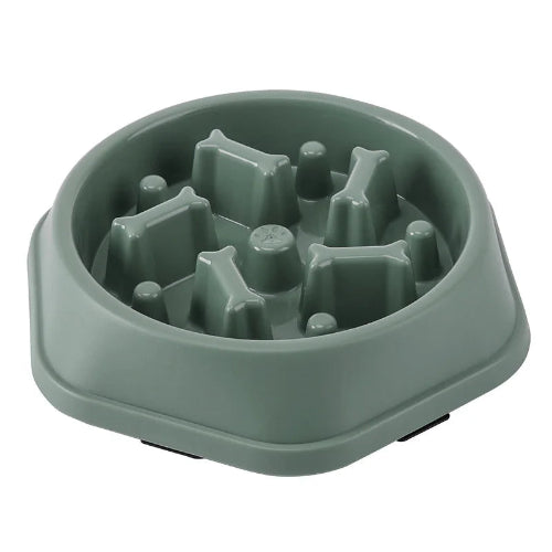 Gamelle anti gloutons avec des os en décoration. Matière plastique résistante de couleur vert. Adaptée pour les croquettes et l’eau. Convient à tous les petits chiens et les chats. Vendue sur la boutique Mon Petit Chihuahua.
