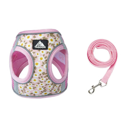 Harnais rose résistant avec motifs pâquerettes pour chiens. Vendu avec avec sa laisse assortie. Confortable, convient aux petits chiens, chihuahuas, ou aux chats.